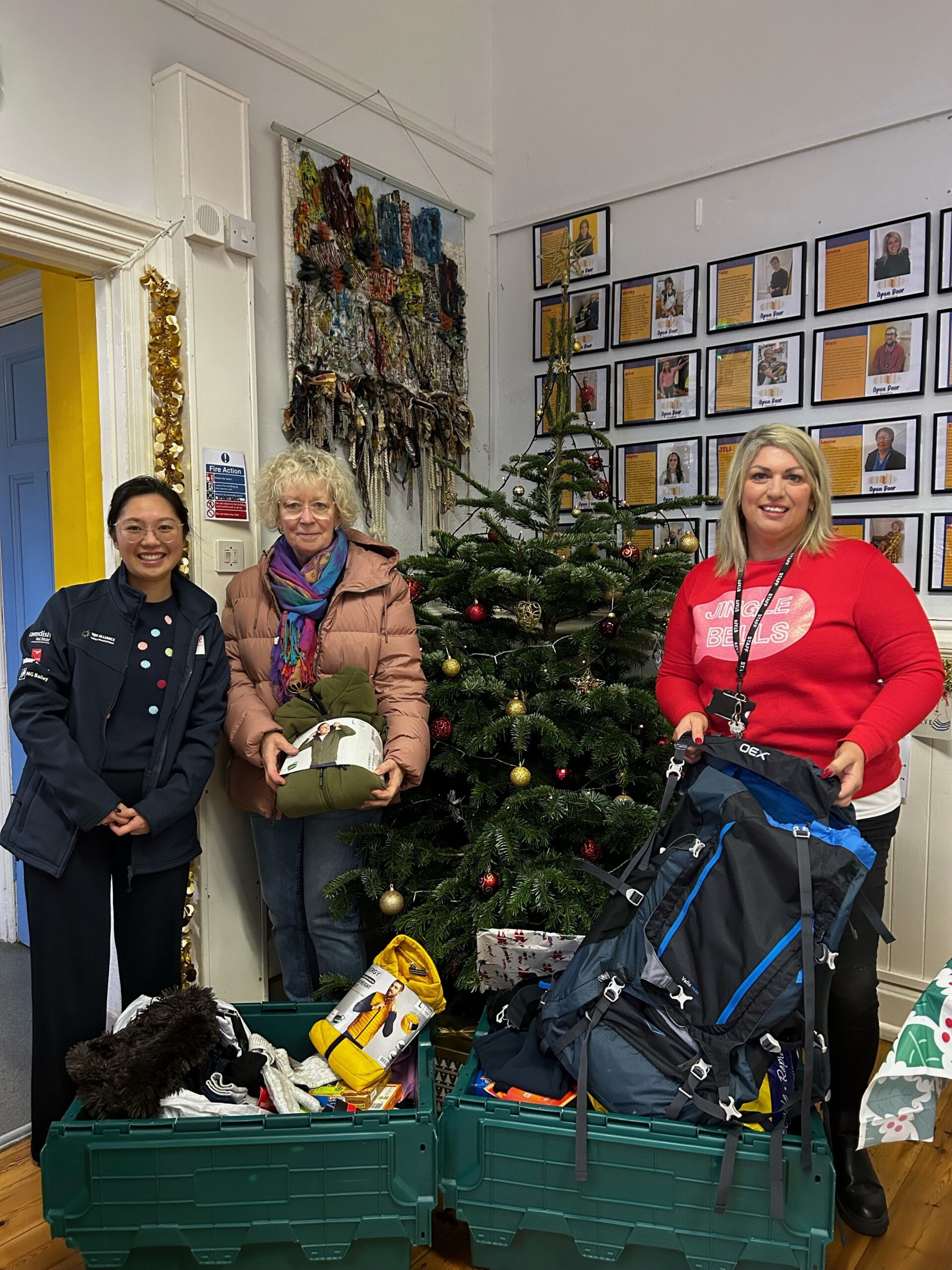 MEH spreads holiday cheer with donations to Open Door Taunton MEH